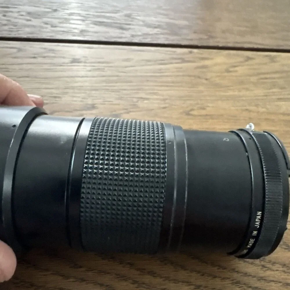 vintage Vivitar 28-85mm f/2.8-3.8 MC macro focusing camera lens.